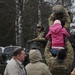 US Soldiers and Latvian child