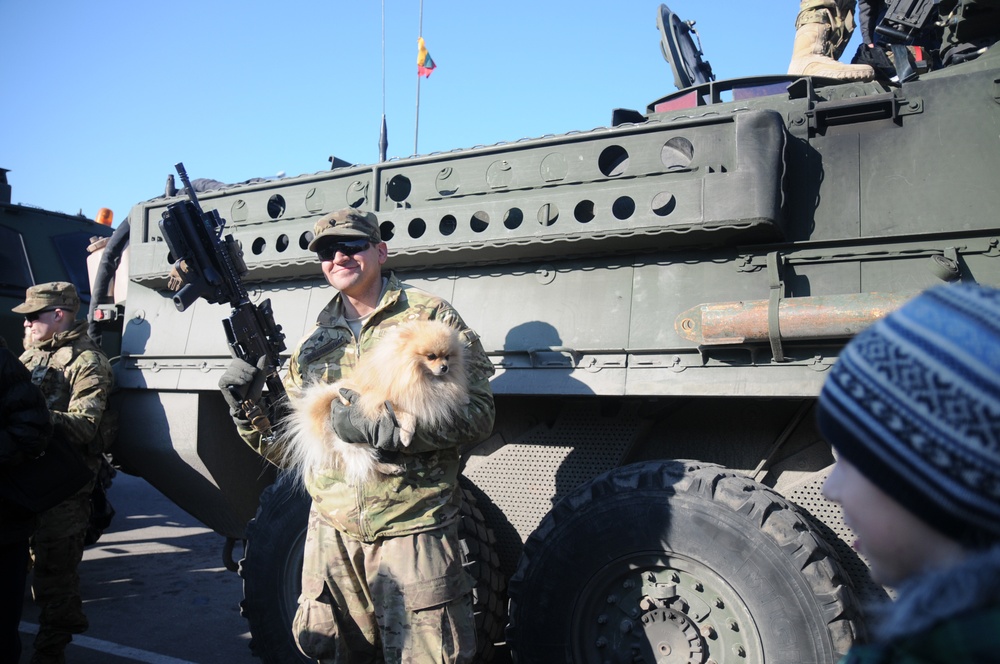 Soldier with machine gun and a dog