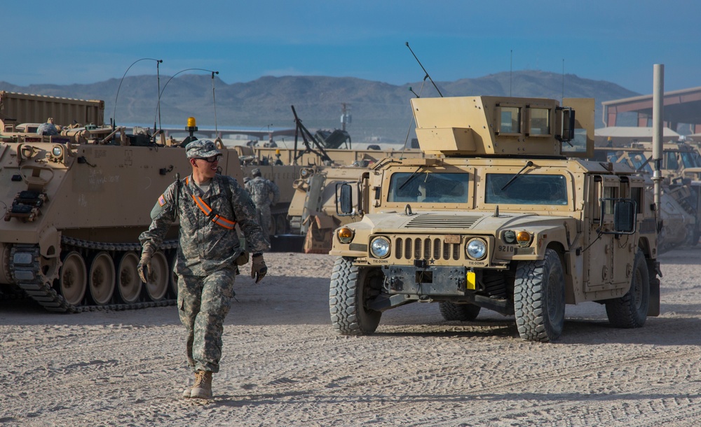 Soldiers assigned to 2nd Brigade Combat Team, 1st Infantry Division, prepare for deployment in the Middle East