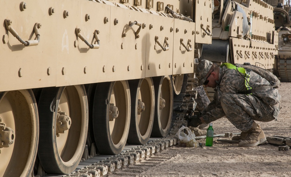 Soldiers assigned to 2nd Brigade Combat Team, 1st Infantry Division prepare for deployment in the Middle east