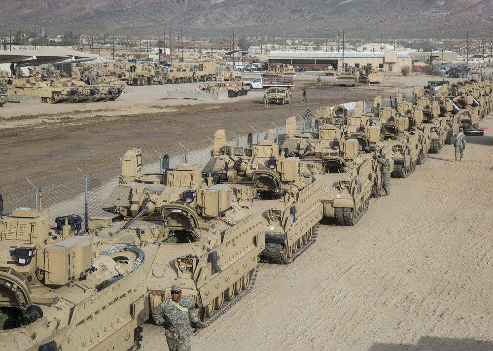 Soldiers assigned to 2nd Brigade Combat Team, 1st Infantry Division, prepare for deployment in the Middle East