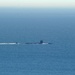USS Hampton transits off coast