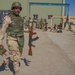 Iraqi soldiers receive rifles