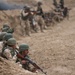Iraqi soldiers prepare to breach obstacle