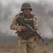 Iraqi soldier runs for cover during training