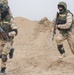 Iraqi soldiers sprint towards objective