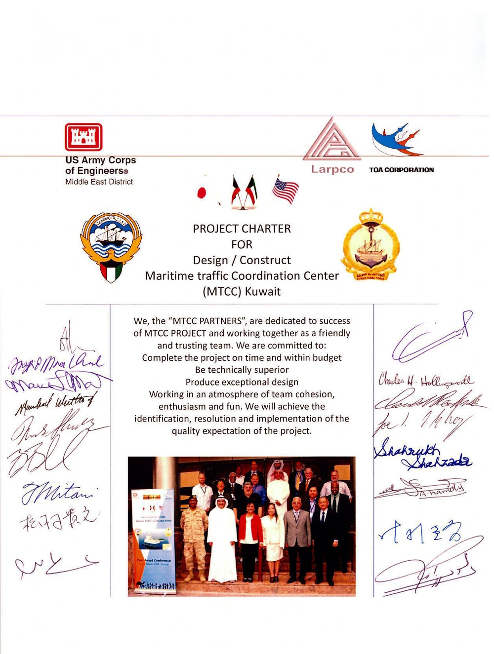 Partnering meeting participants sign project charter