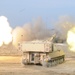Several M109A6 Paladin self-propelled howitzers conduct test fire