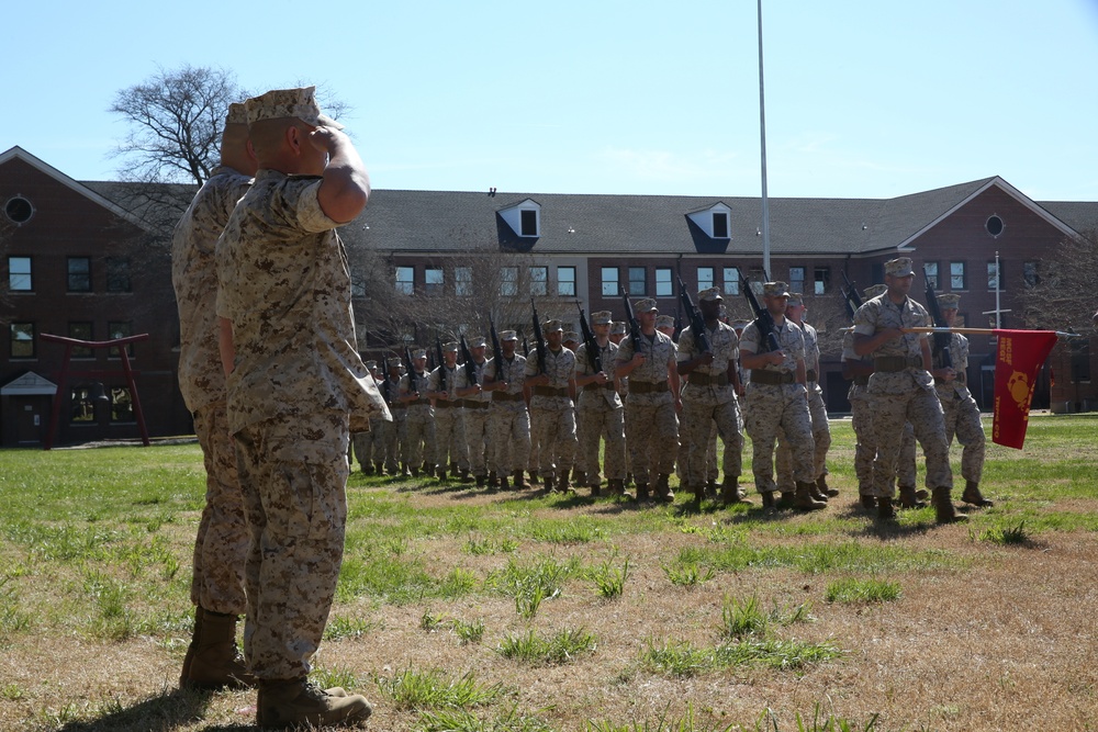 Marines salute Sergeants Major during pass and review