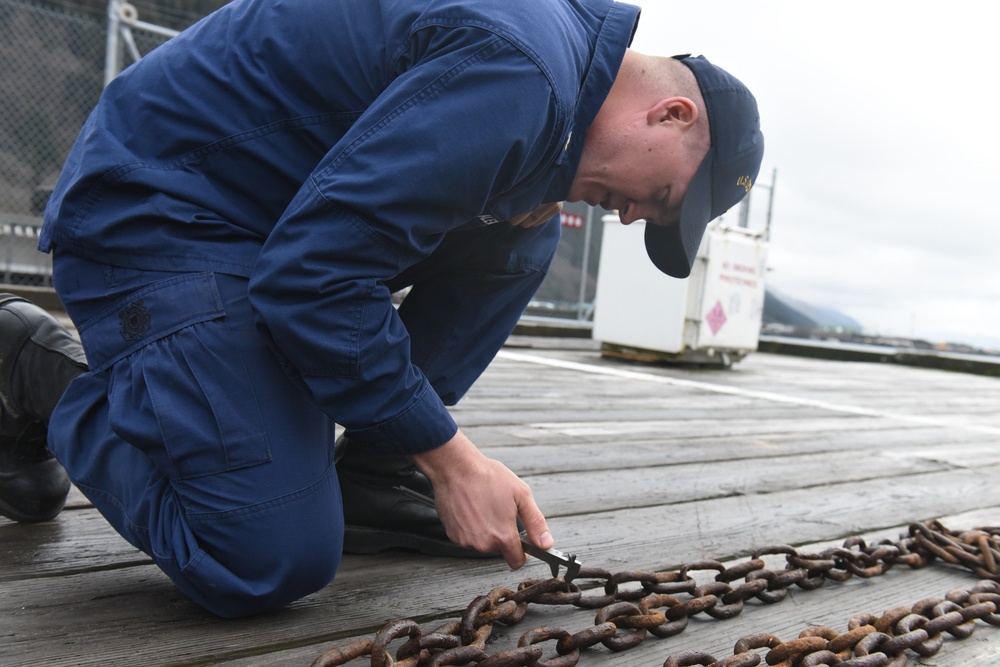 Coast Guard Cutter Elderberry prepares buoys