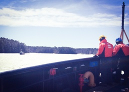 Coast Guard Cutters Tackle and Thunder Bay pass each other while breaking ice on the Kennebec River