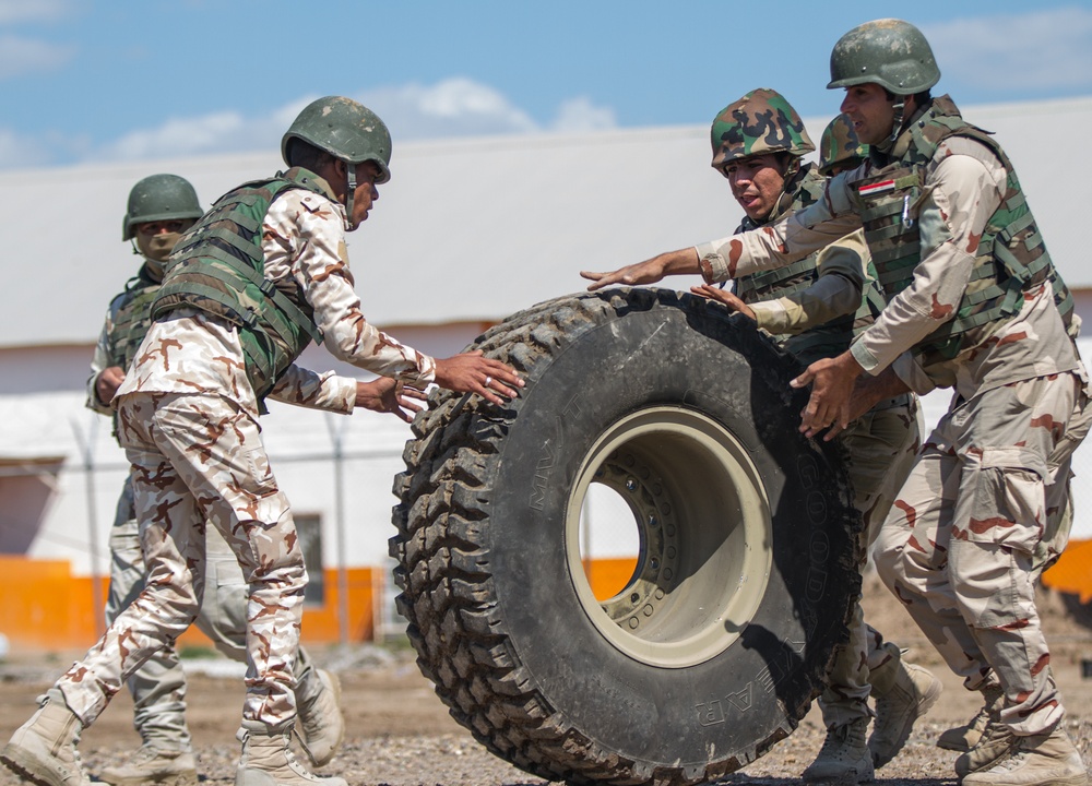 Iraqi soldiers race to repair tire