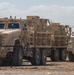 Iraqi soldiers prepare MRAP for tow