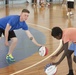 US Marines mentor local children at basketball clinic