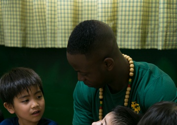 Marines, Okinawa residents share traditions during USO Easter celebration