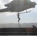 Marines fast rope from hueys during WTI