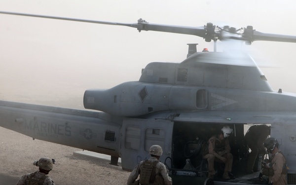 Marines fast rope from hueys during WTI