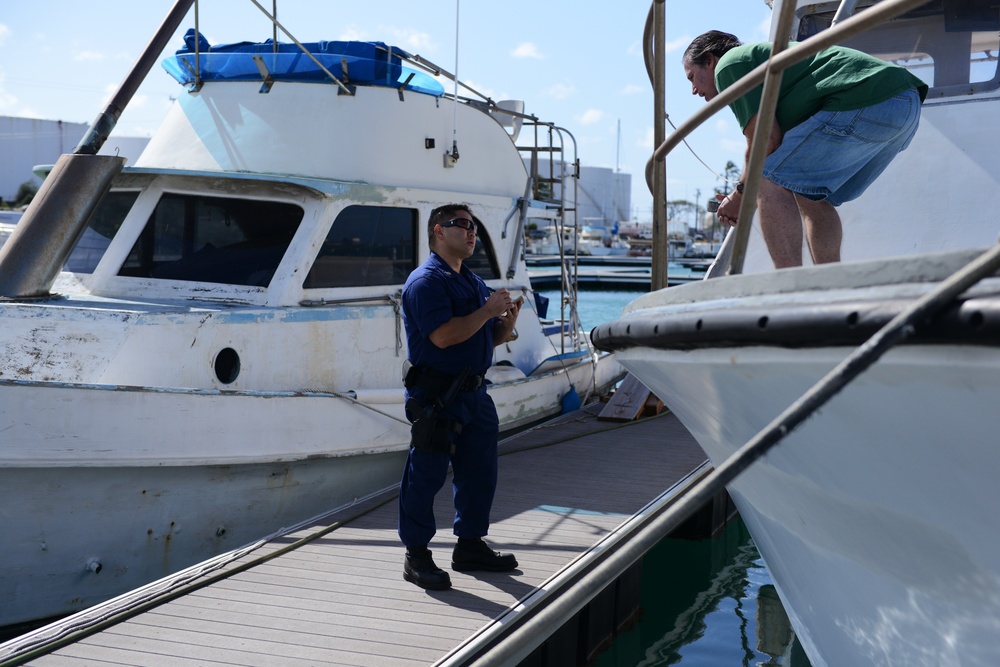 Members from Coast Guard Sector Honolulu enforcement division conduct harbor patrols