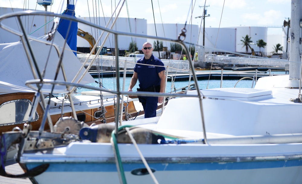 Members from Coast Guard Sector Honolulu enforcement division conduct harbor patrols