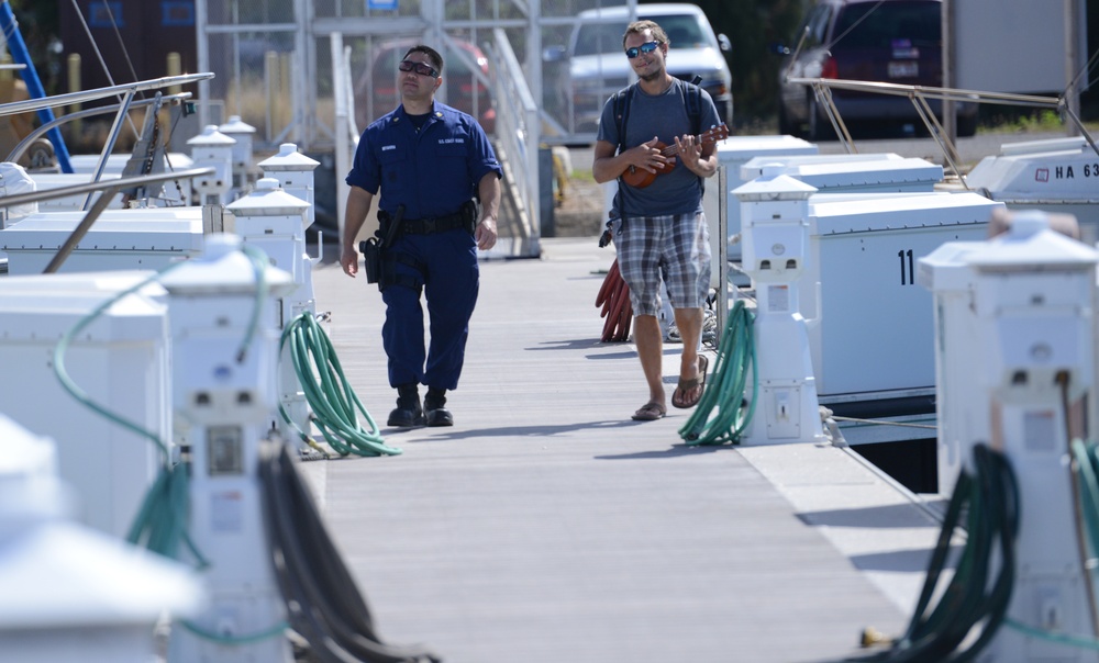 Members from Coast Guard Sector Honolulu enforcement division conduct harbor patrols