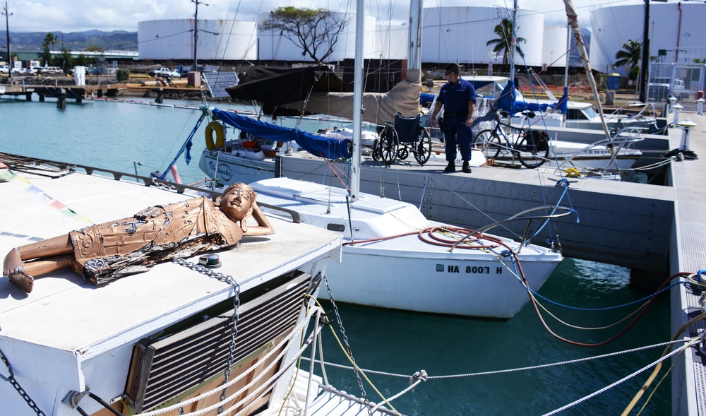 Members from Coast Guard Sector Honolulu enforcement division conduct harbor patrols