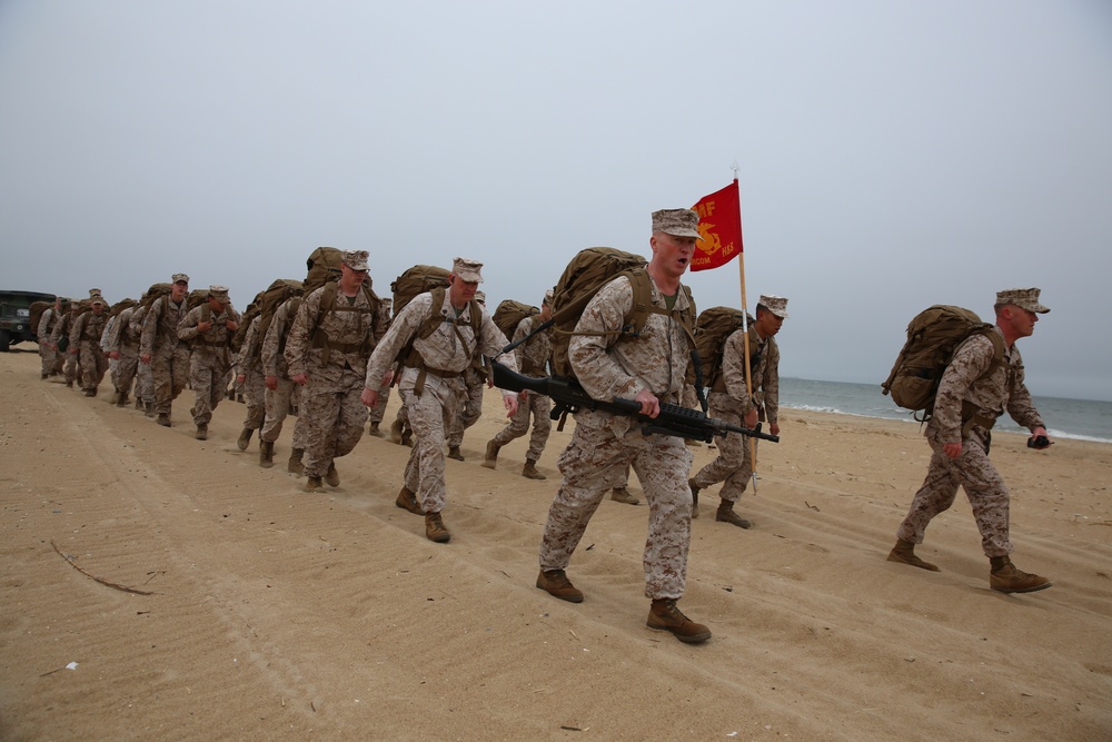 Colonel leads Marines and sailors during hike