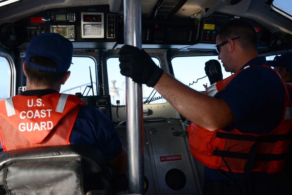 Coast Guard conducts boarding at sea