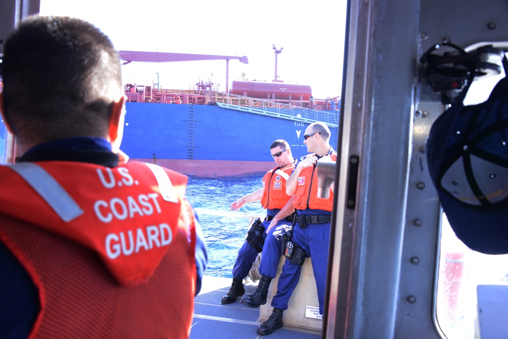 Coast Guard conducts boarding at sea