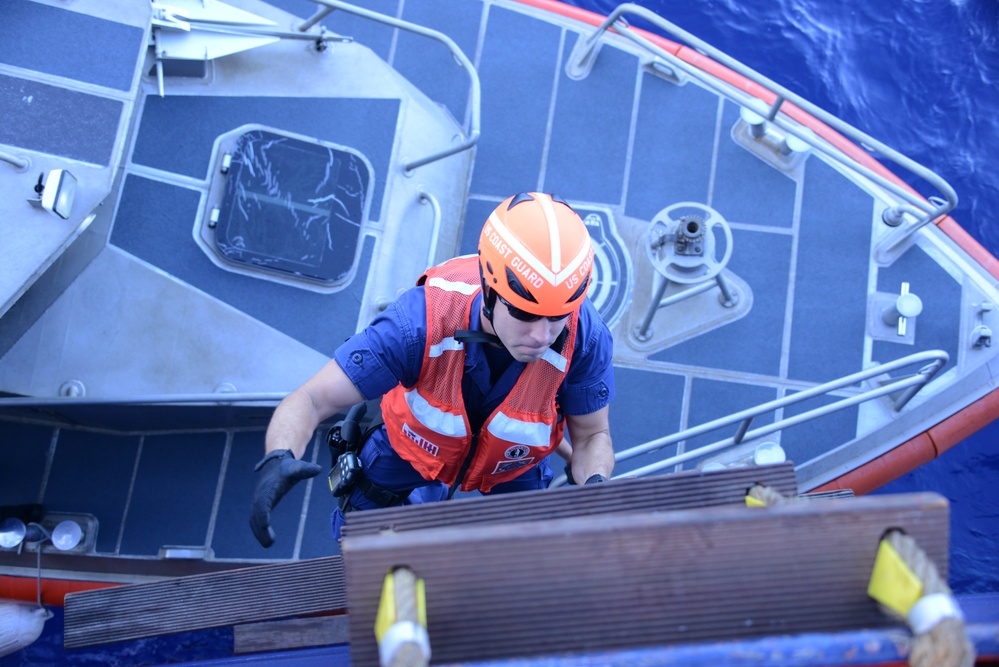 Coast Guard conducts boarding at sea