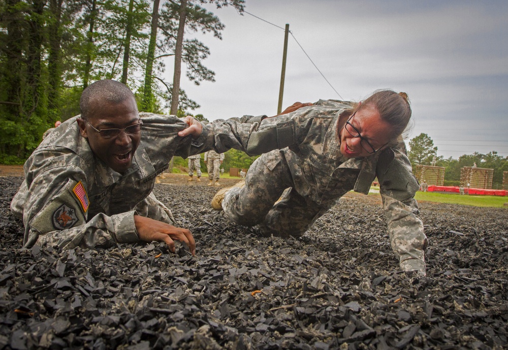 Senior officers low-crawl to the finish line