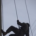 Marine Corps Musicians Hanging from Ropes