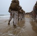 Marines conduct beach hike enhancing unit morale, maintain combat readiness
