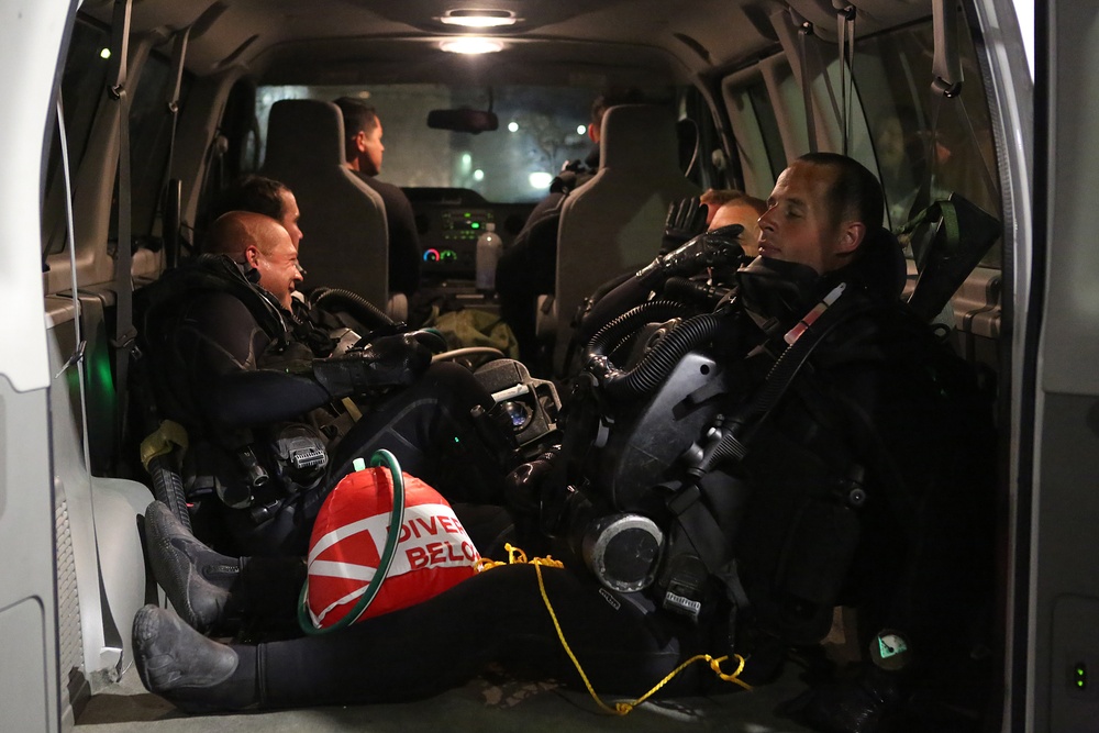 Marine combat divers execute clandestine dive mission