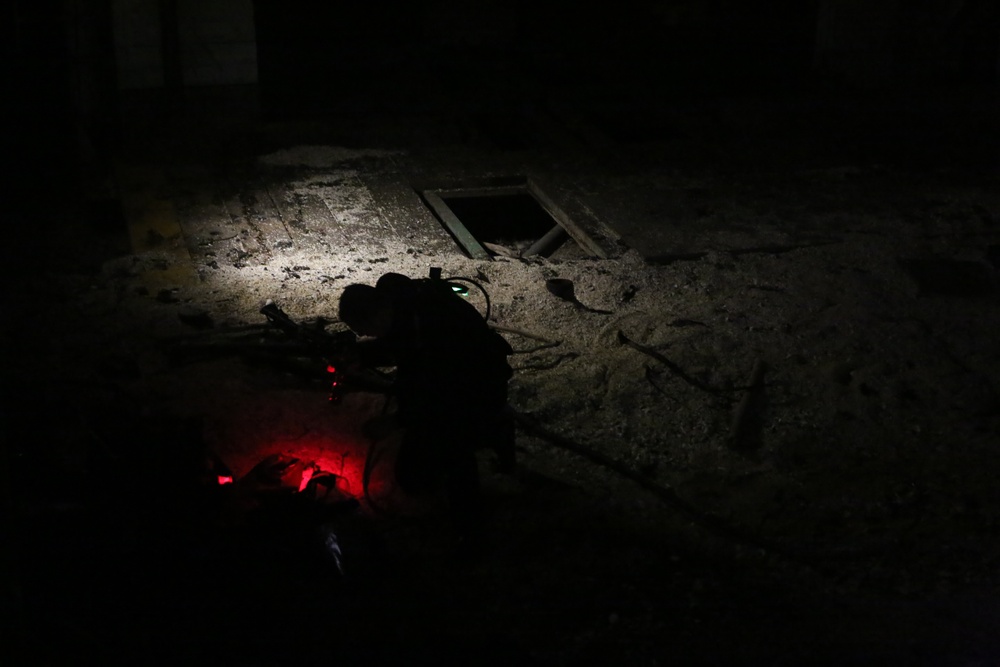 Marine combat divers execute clandestine dive mission