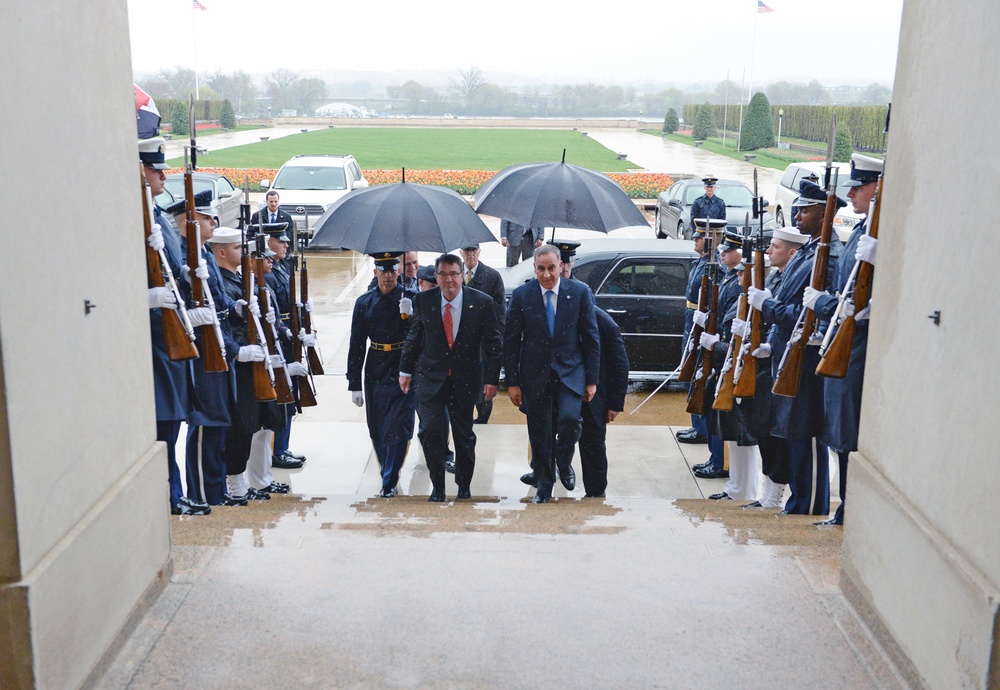 Secretary of Defense Ash Carter walks Haider al-Abadi Prime Minister of Iraq
