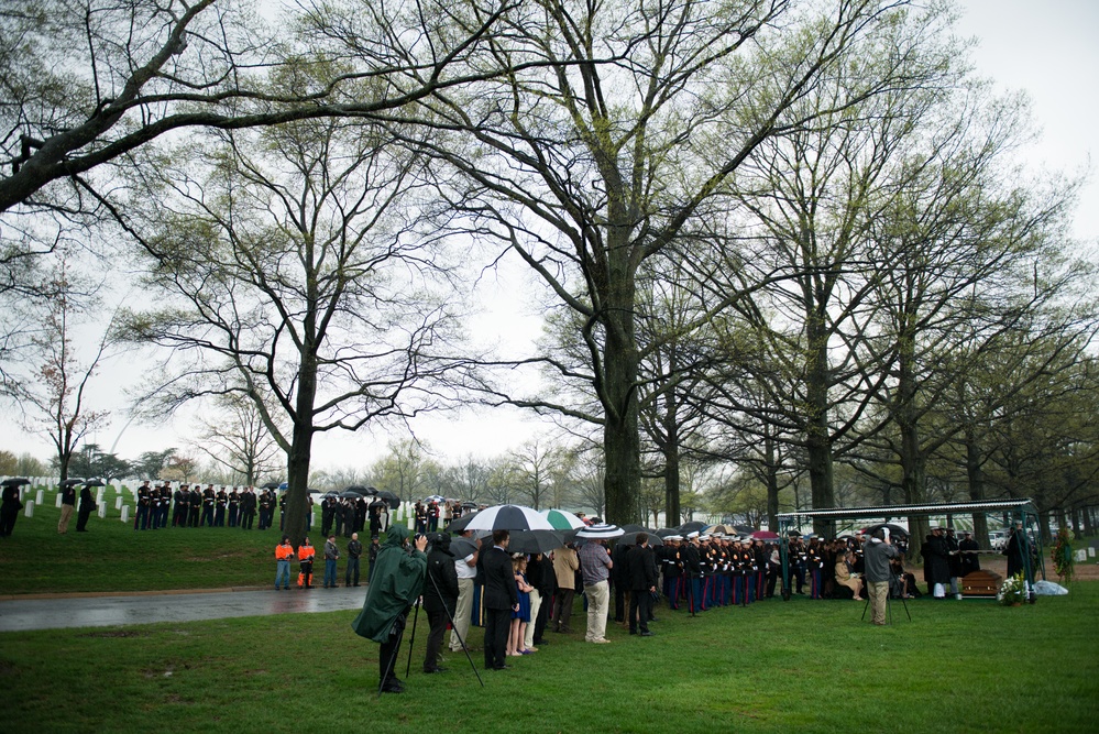Attendees watch graveside service in Arlington National Cemetery