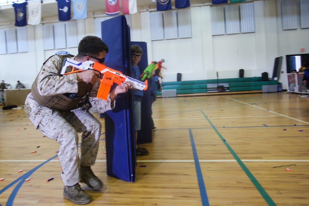 Shoot ‘em up: Marines, children duke it out in Nerf battle