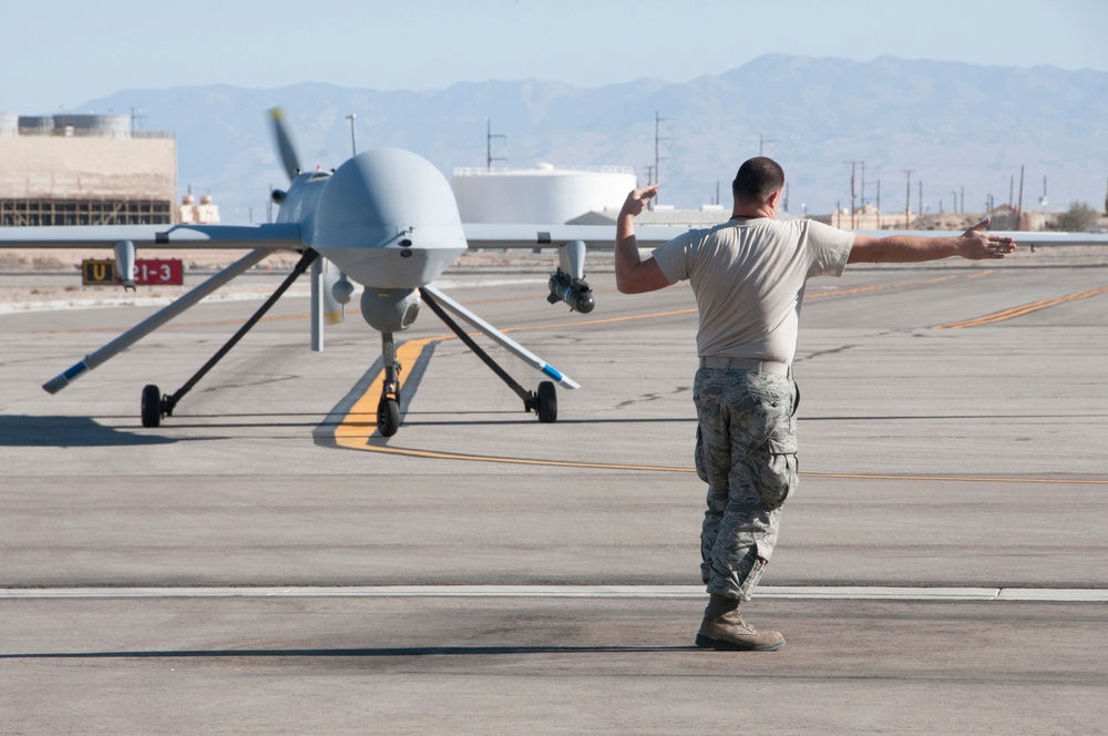 The Cal Guard’s MQ-1 Predators are handed back for the last time after a series of firsts / Aircraft maintenance aims high with air power