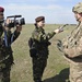 US Troopers, Romanian Land Forces and British soldiers participate in opening ceremonies for Exercise Wind Spring