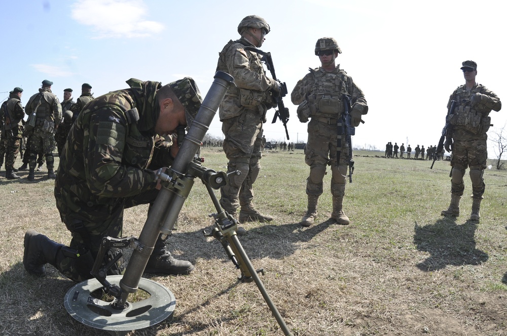 US Troopers, Romanian Land Forces and British soldiers participate in opening ceremonies for Exercise Wind Spring