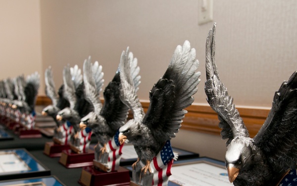 Military members pay tribute to local employer