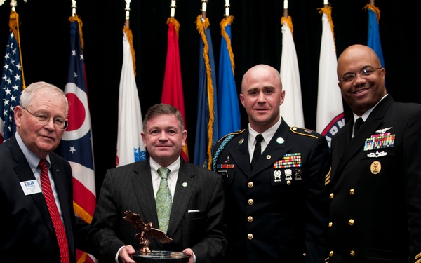 Military members pay tribute to local employer