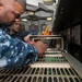 USS Bonhomme Richard: Aviation Electrician's Mate troubleshoots equipment
