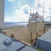 Navy Cargo Handling Batallion One loads munitions