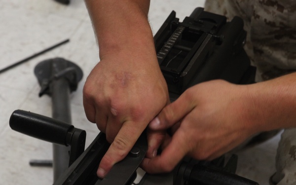 Marines learn the ins and outs of maintaining machine guns
