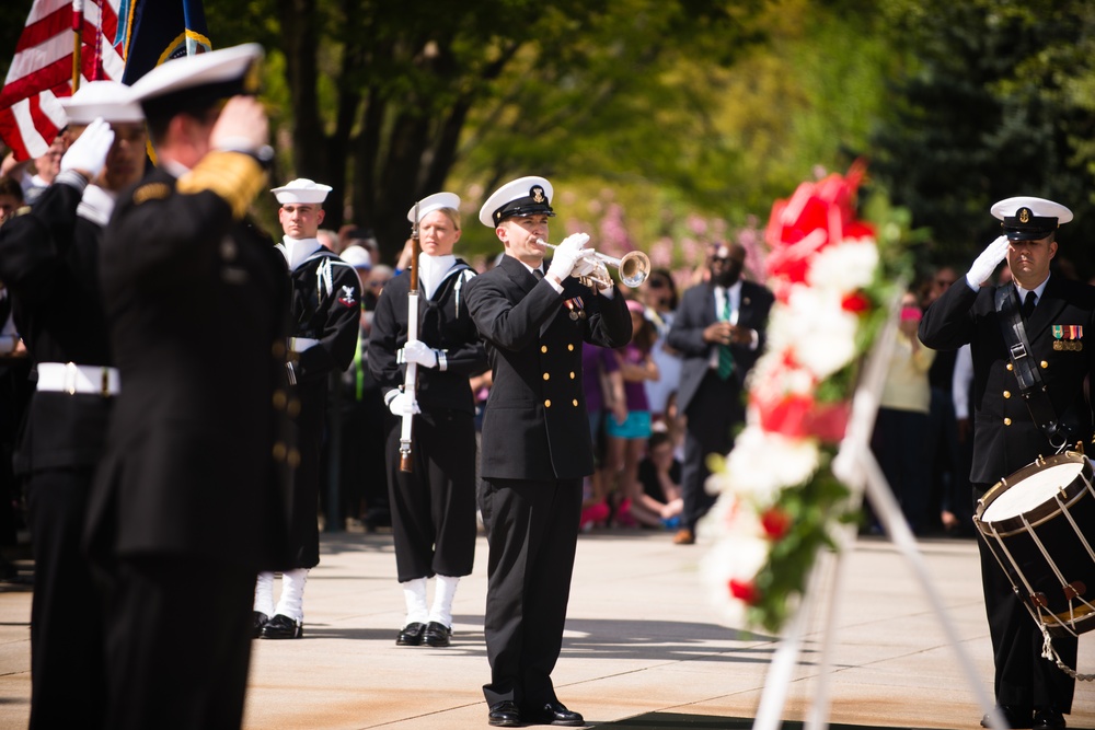 US Navy bugler plays taps during wreath-laying ceremony at the Tomb of the Unknown Soldier, Arlington National Cemetery