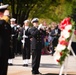 US Navy bugler plays taps during wreath-laying ceremony at the Tomb of the Unknown Soldier, Arlington National Cemetery