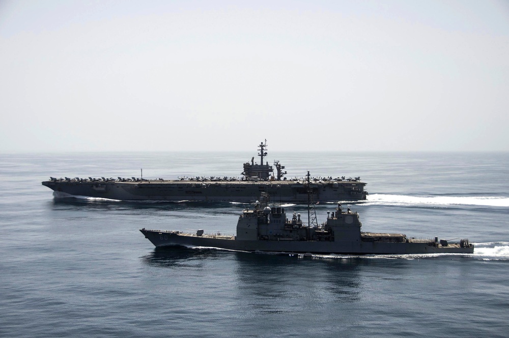 USS Theodore Roosevelt, USS Normandy underway in the Arabian Sea