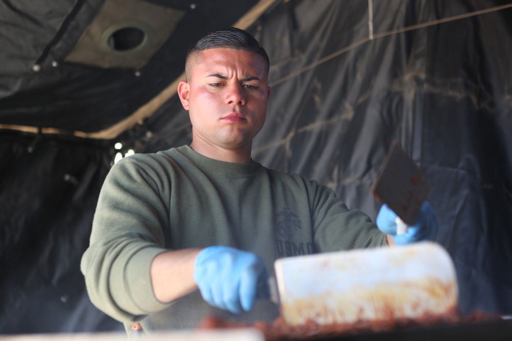 1st LAR food service specialist spices up field rations at Desert Scimitar