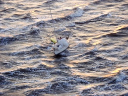 Coast Guard rescues 3 from grounded vessel